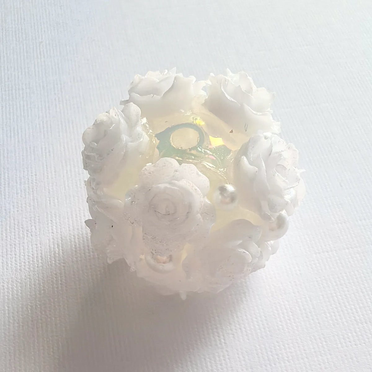 White rose flower ball bead with opaque white rose petals, pearl-like accents and a threading hole.