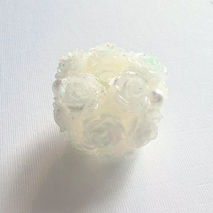 Pale green rose flower ball bead with translucent rose petals, pearl-like accents and a threading hole.