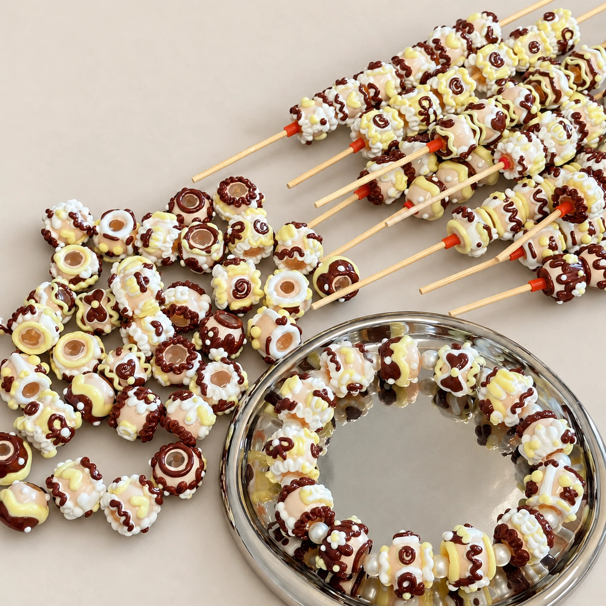 Black and white chocolate inspired handmade dimensional 3D beads with cocoa brown cream and pale yellow decoration