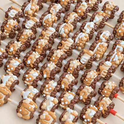 Light coffee brown 3D hand-painted beads with assorted cream and caramel decorative designs
