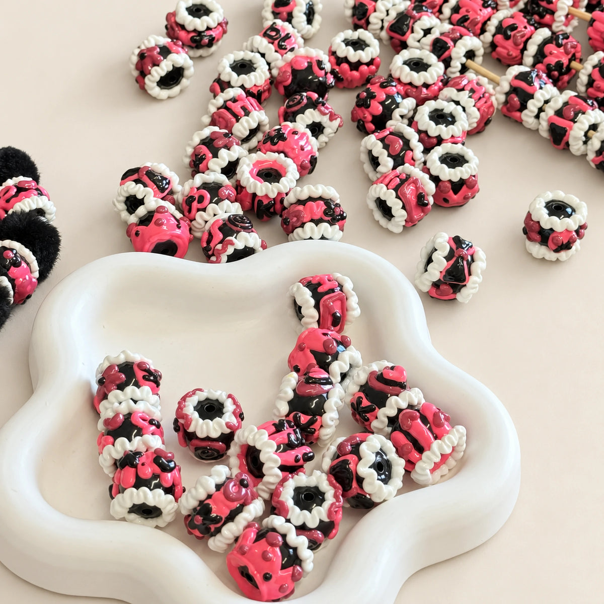 Midnight fuchsia and black hand-painted 3D beads with white ruffled details for DIY phone charms