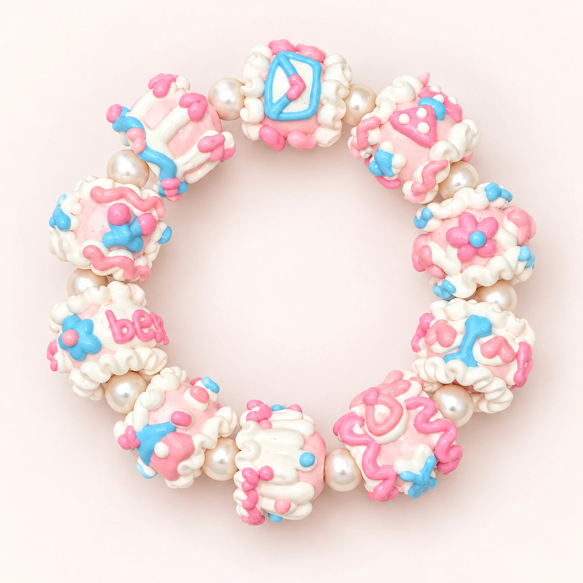 Finished handmade bracelet design with pink and blue hand-painted 3D beads and pearl-style spacers