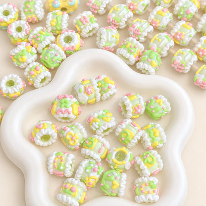 Spring Meadow yellow and green 3D hand-painted decorative beads in a cream petal dish